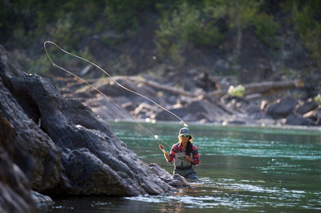 person fly fishing
